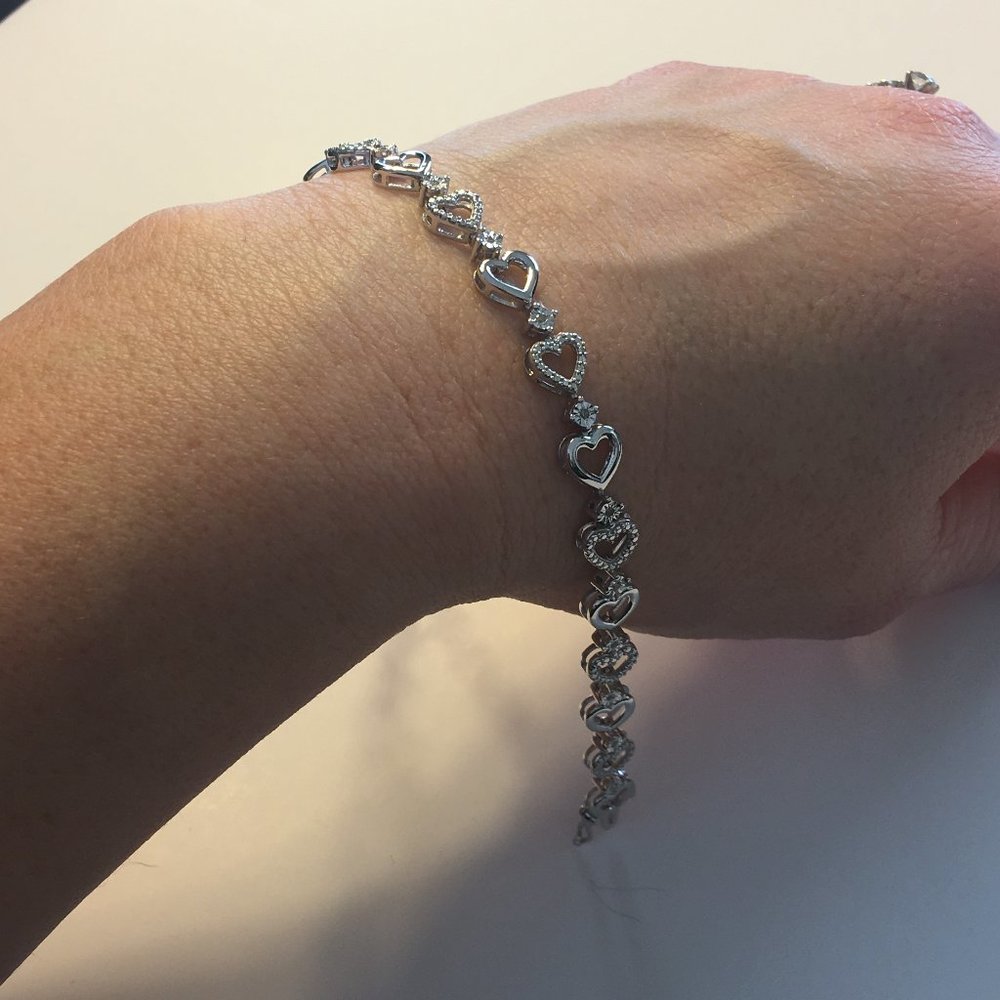 1/10 CT. T.W. White Diamond Heart Tennis Bracelet - Picture 7 of 9